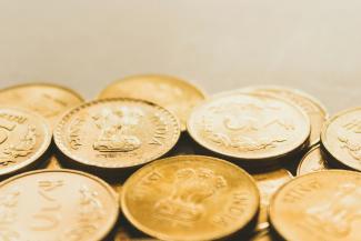 round gold-colored coin lot by rupixen courtesy of Unsplash.