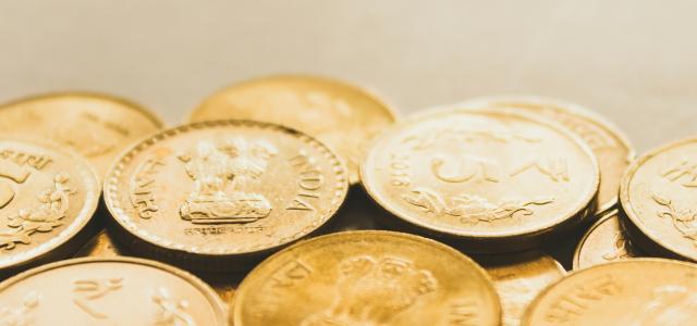 round gold-colored coin lot by rupixen courtesy of Unsplash.